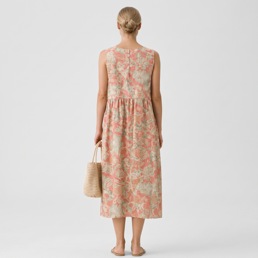 Tove | Ledig blommig midiklänning med fickor